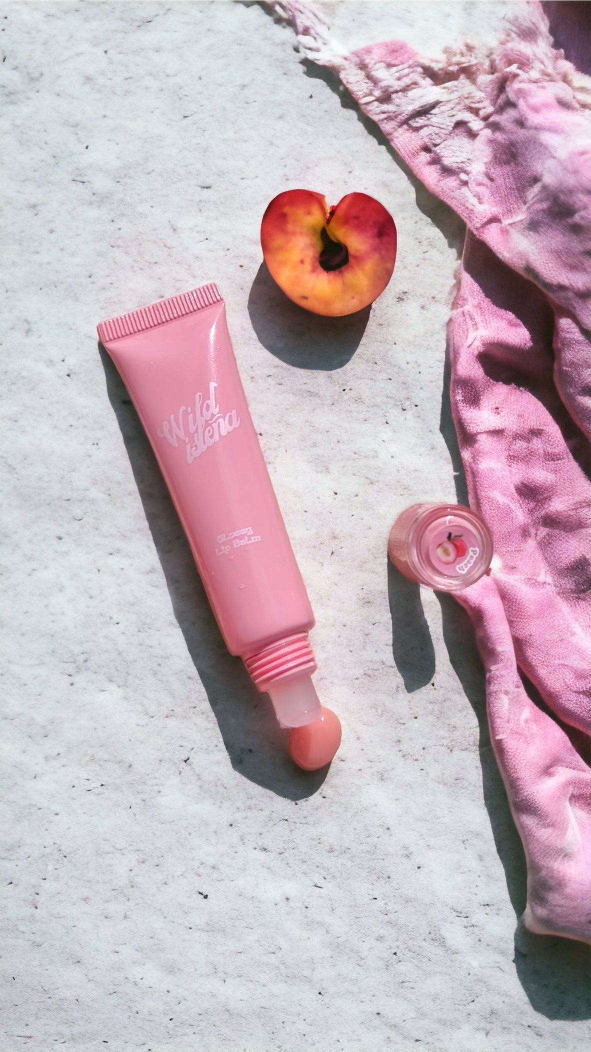 Peachy, glossy lip balm