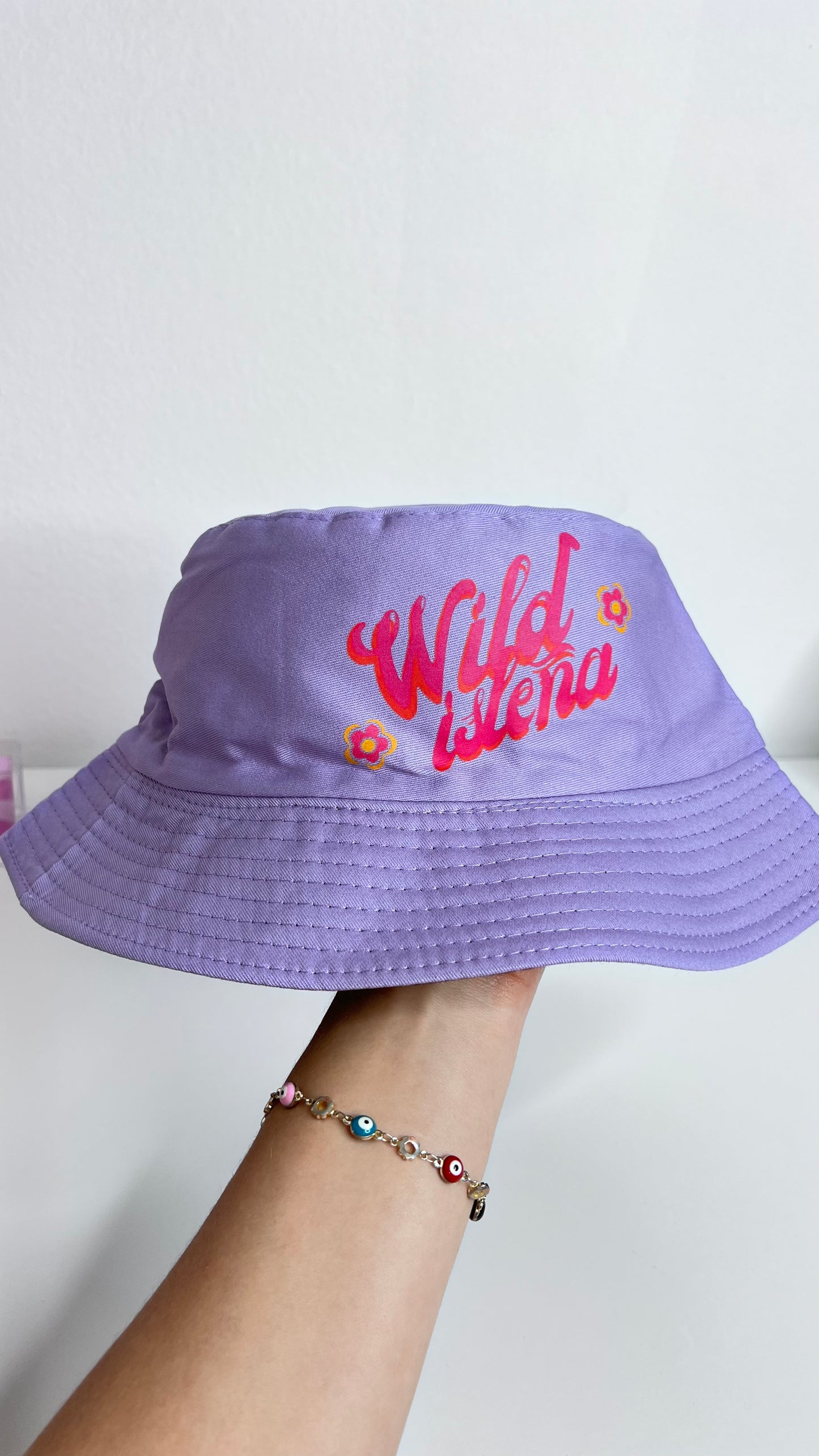 Wild isleña bucket hat one side logo, purple & black