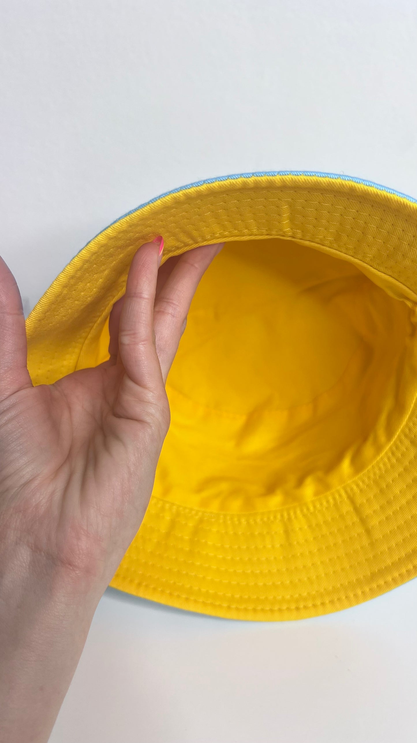 Wild isleña bucket hat one side logo, blue & mustard